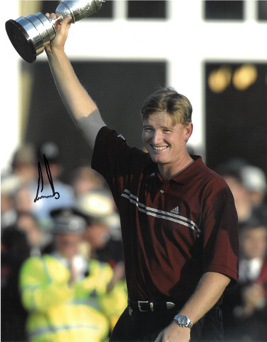 Ernie Els signed PGA 11x14 Photo- JSA Hologram #DD32783  (w/ Trophy at 2002 Open Championship)