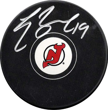 Travis Zajac signed New Jersey Devils Hockey Puck #19- Leaf Authentic Hologram
