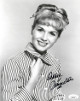 Debbie Reynolds signed Vintage B&W 8x10 Photo - JSA Hologram #DD32825 (striped blouse- sig on right)
