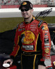 Martin Truex Jr. signed NASCAR Bass Pro Shops 8x10 Photo- JSA Hologram #DD32936 (wearing hat)